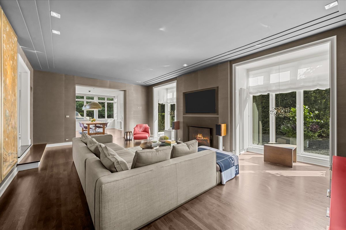 1106 Seneca Road Wilmette, IL 60091 - Photo 14 of 79 a living room with furniture and a flat screen tv