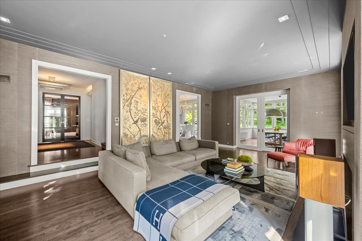 1106 Seneca Road Wilmette, IL 60091 - Photo 18 of 79 a living room with furniture and a large window