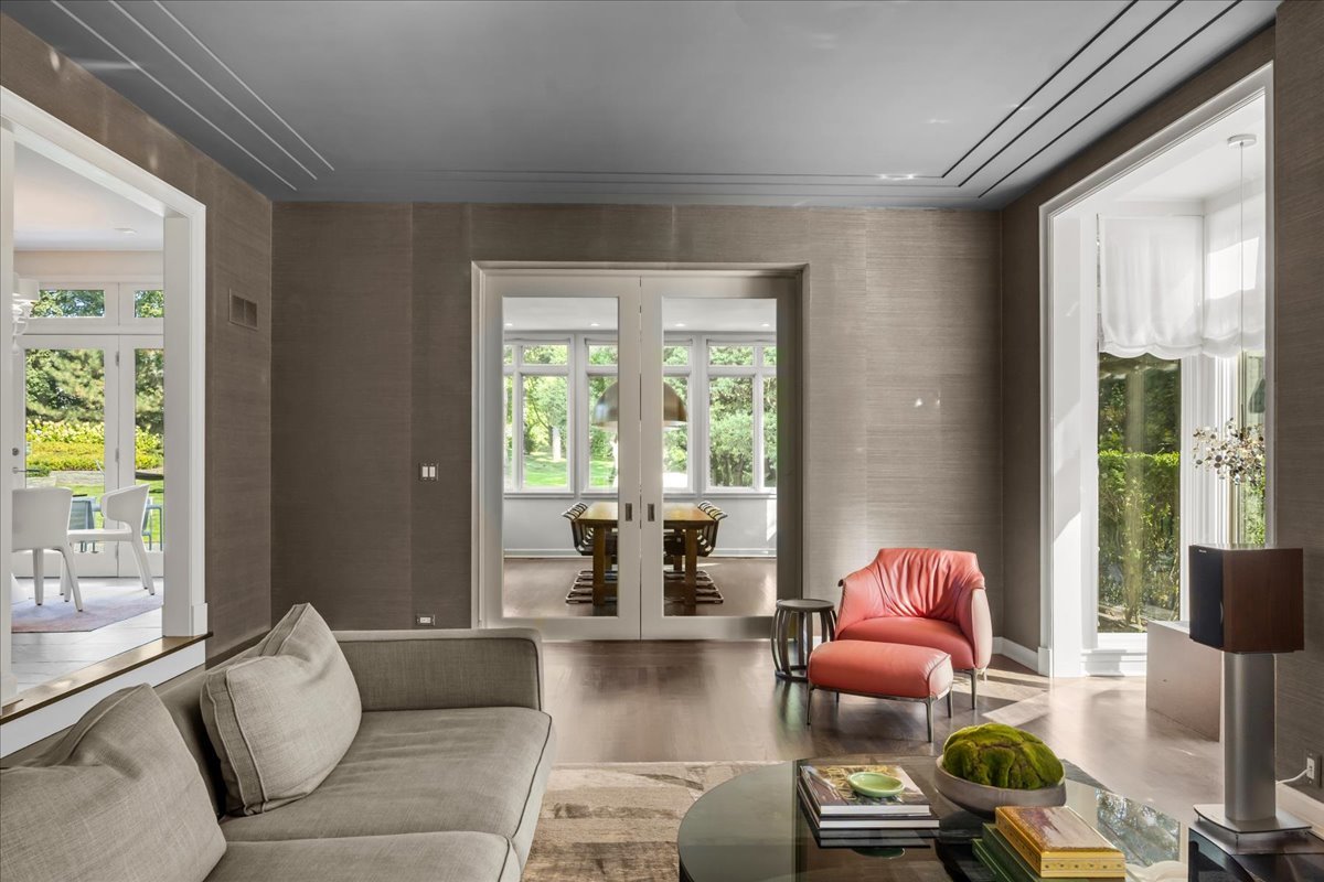 1106 Seneca Road Wilmette, IL 60091 - Photo 19 of 79 a living room with furniture and a large window