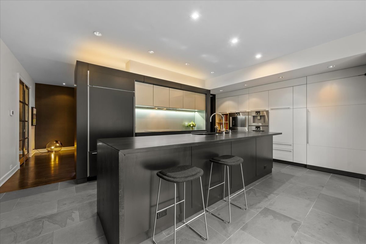 1106 Seneca Road Wilmette, IL 60091 - Photo 32 of 79 a kitchen with a table and chairs