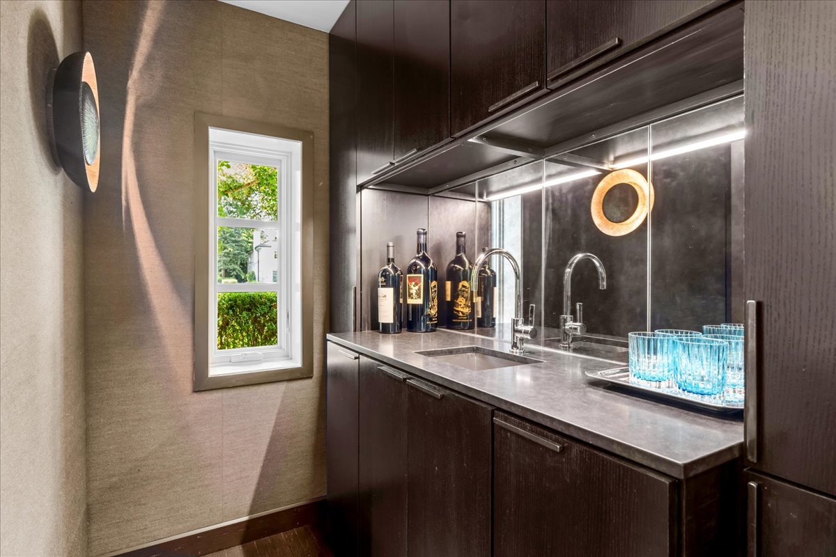 1106 Seneca Road Wilmette, IL 60091 - Photo 37 of 79 a kitchen with stainless steel appliances granite countertop a sink and a window