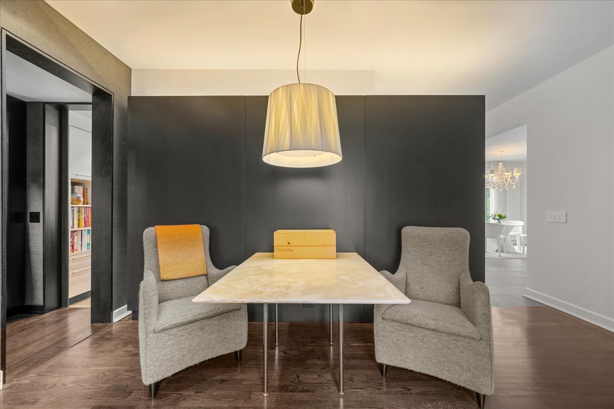 1106 Seneca Road Wilmette, IL 60091 - Photo 39 of 79 a living room with furniture a rug and a window