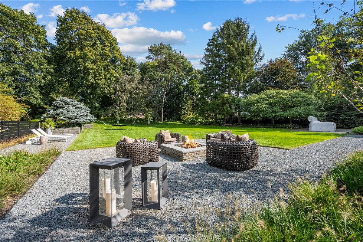 1106 Seneca Road Wilmette, IL 60091 - Photo 4 of 79 a view of a sitting area with swimming pool and sitting area