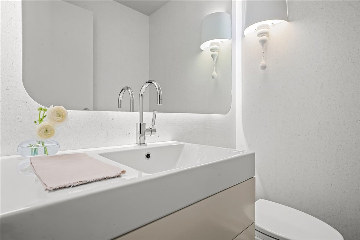 1106 Seneca Road Wilmette, IL 60091 - Photo 41 of 79 a bathroom with a sink and toilet