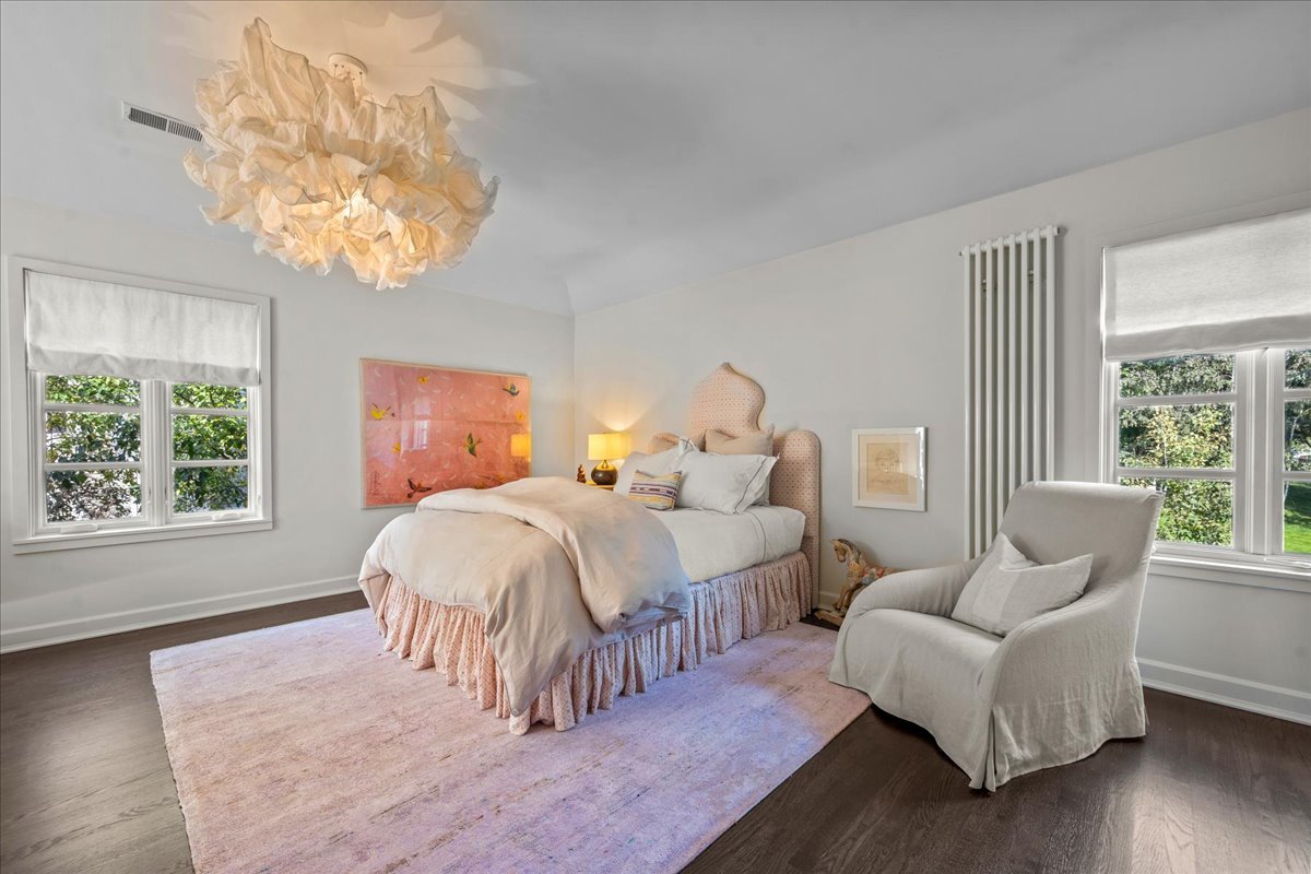 1106 Seneca Road Wilmette, IL 60091 - Photo 53 of 79 a bedroom with a bed and a couch