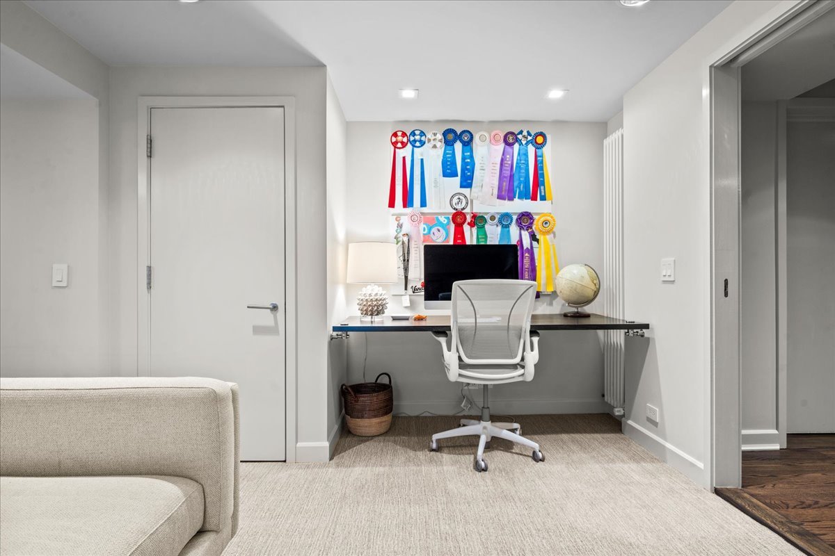 1106 Seneca Road Wilmette, IL 60091 - Photo 66 of 79 a view of a workspace with furniture and a window