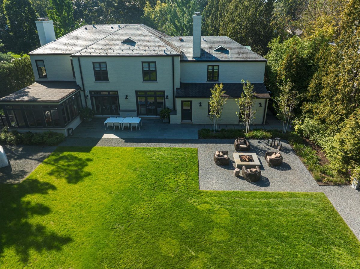 1106 Seneca Road Wilmette, IL 60091 - Photo 77 of 79 a front view of a house with a garden and trees