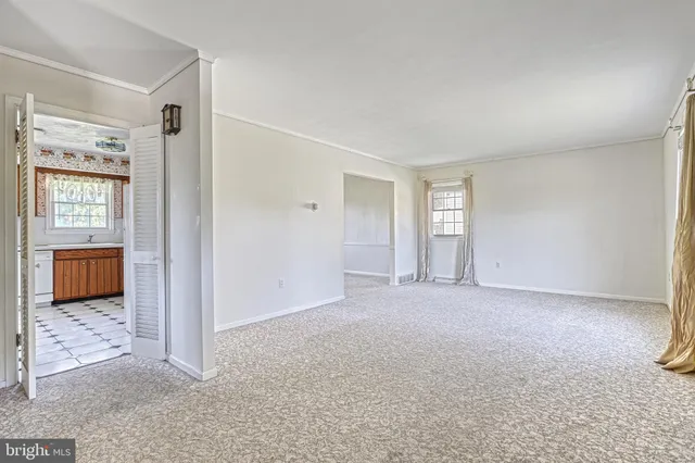 an empty room with windows