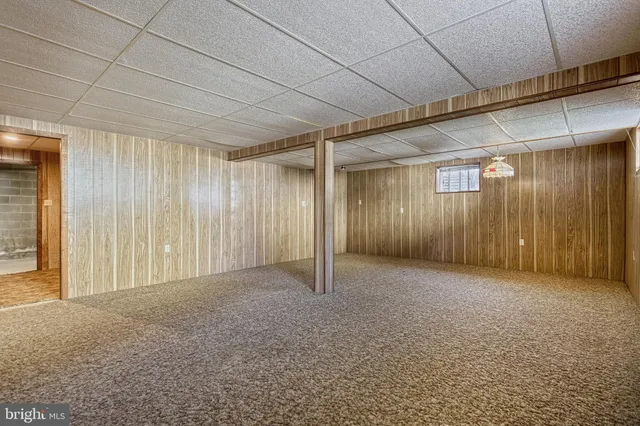 a aerial view of a house with a yard