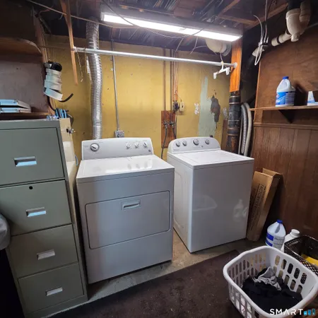 a utility room with dryer and washer