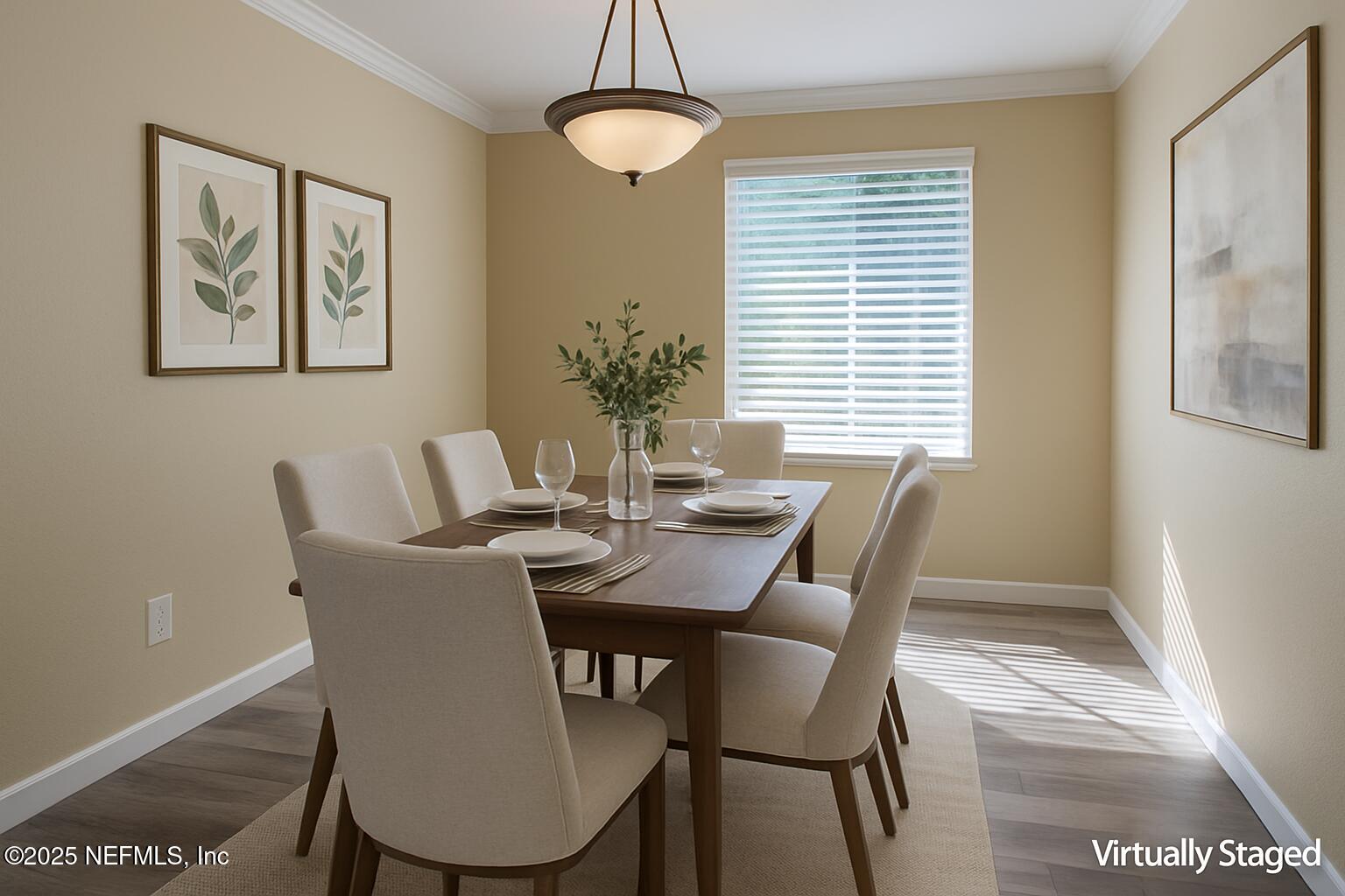 8880 Old Kings Road South, Unit 6 Jacksonville, FL 32257 - Photo 11 of 27 a view of a dining room with furniture window and wooden floor