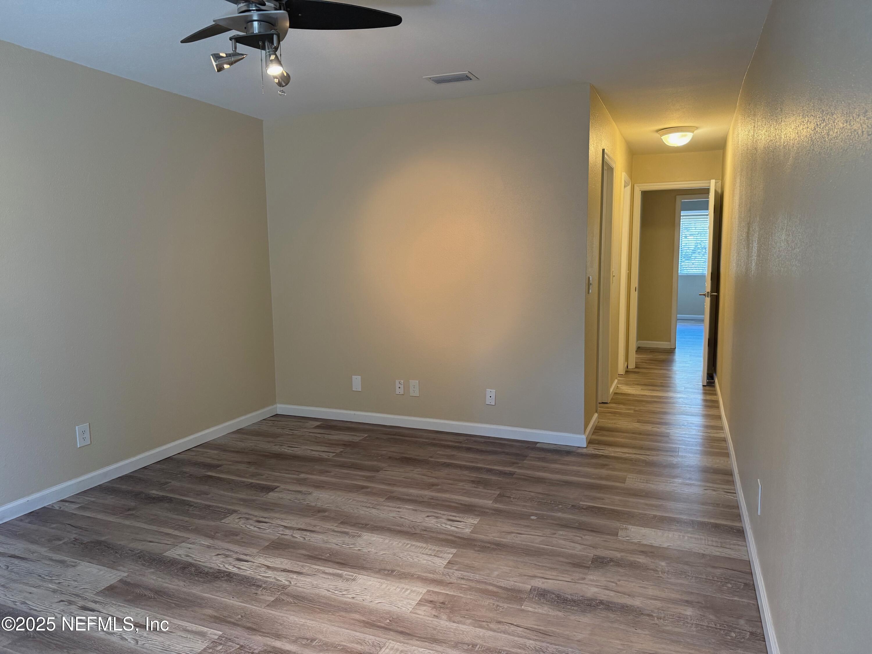 8880 Old Kings Road South, Unit 6 Jacksonville, FL 32257 - Photo 22 of 27 a view of a room with wooden floor