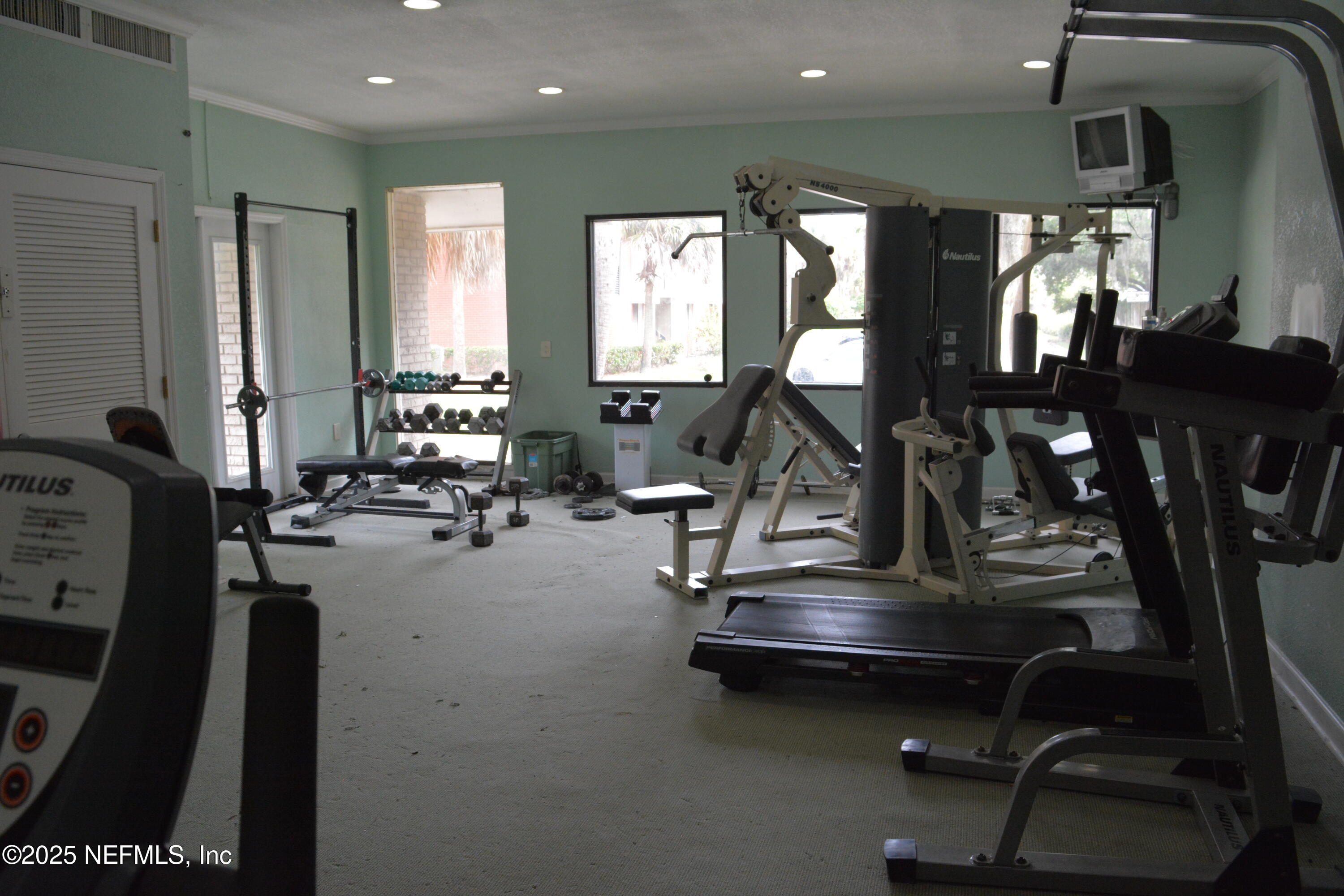 8880 Old Kings Road South, Unit 6 Jacksonville, FL 32257 - Photo 26 of 27 a view of a room with gym equipment