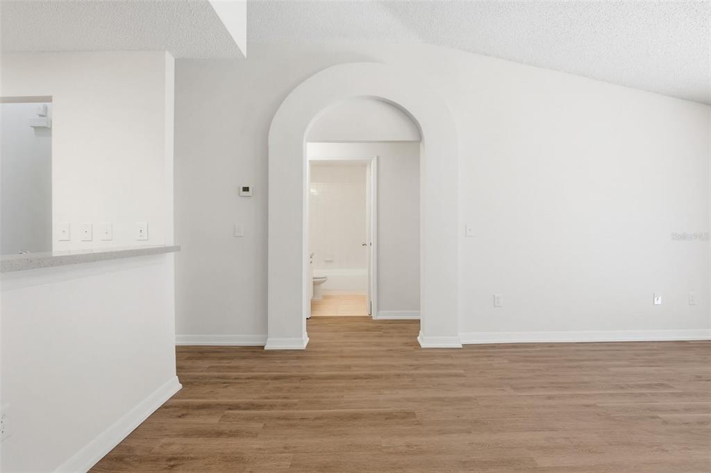 305 Abigail Road Plant City, FL 33563 - Photo 13 of 37 a view of a room with wooden floor