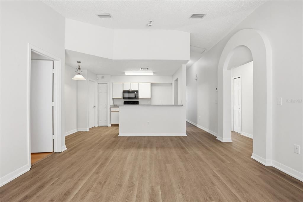 305 Abigail Road Plant City, FL 33563 - Photo 22 of 37 a view of empty room with wooden floor