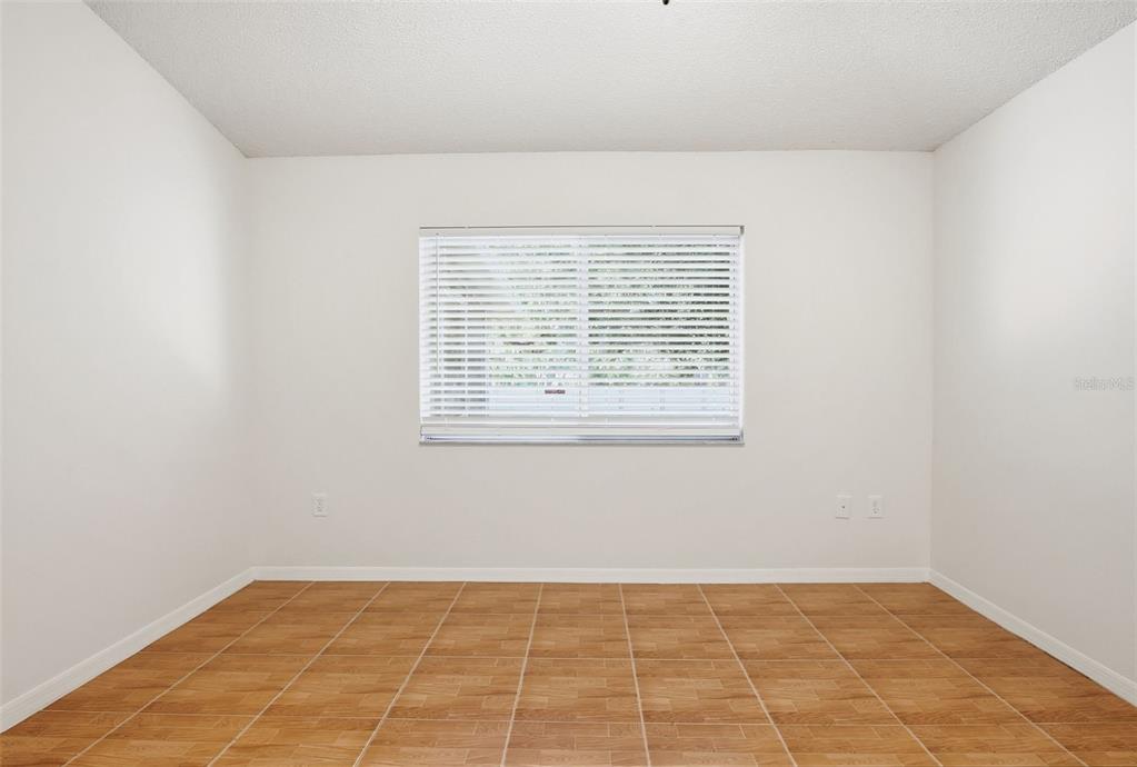 305 Abigail Road Plant City, FL 33563 - Photo 25 of 37 a view of an empty room with a window