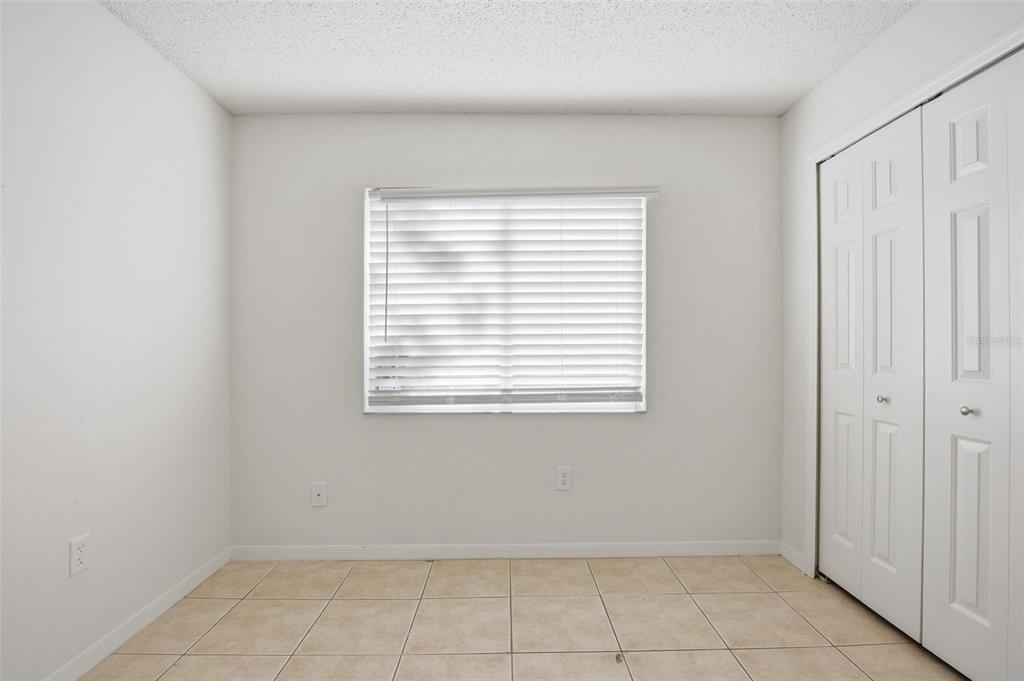 305 Abigail Road Plant City, FL 33563 - Photo 27 of 37 an empty room with a window