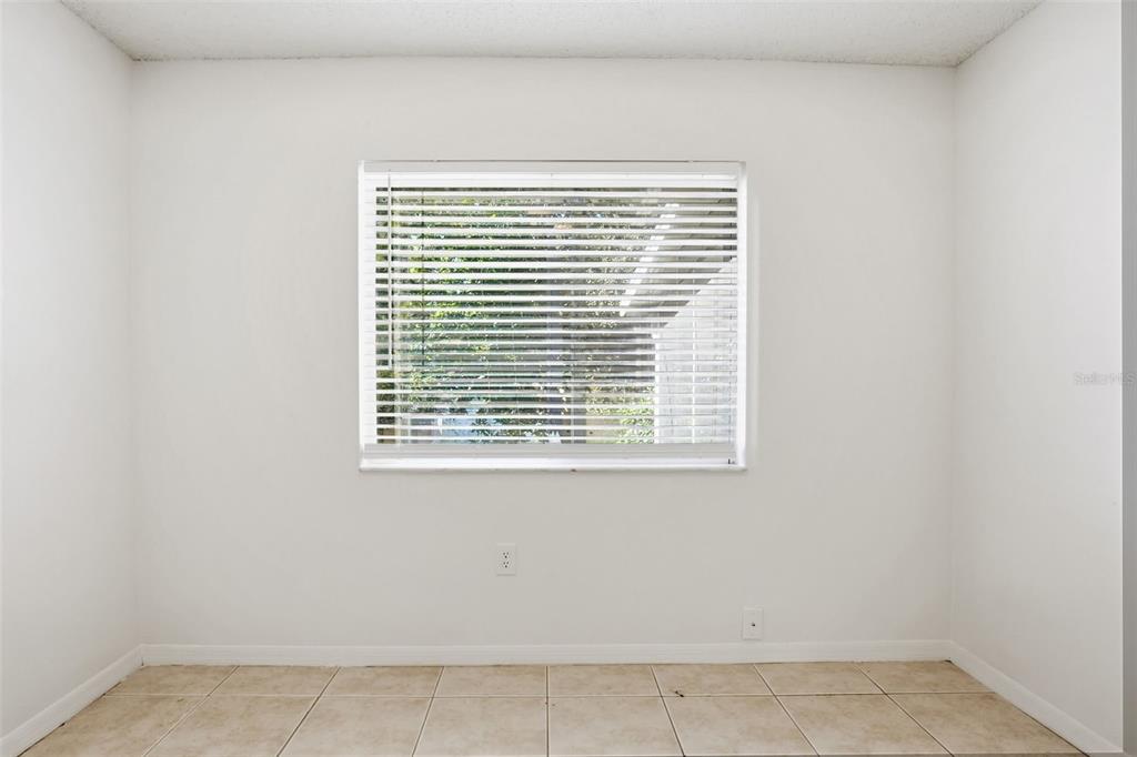 305 Abigail Road Plant City, FL 33563 - Photo 29 of 37 a view of an empty room with a window