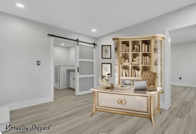 a view of a kitchen with a sink cabinets and wooden floor