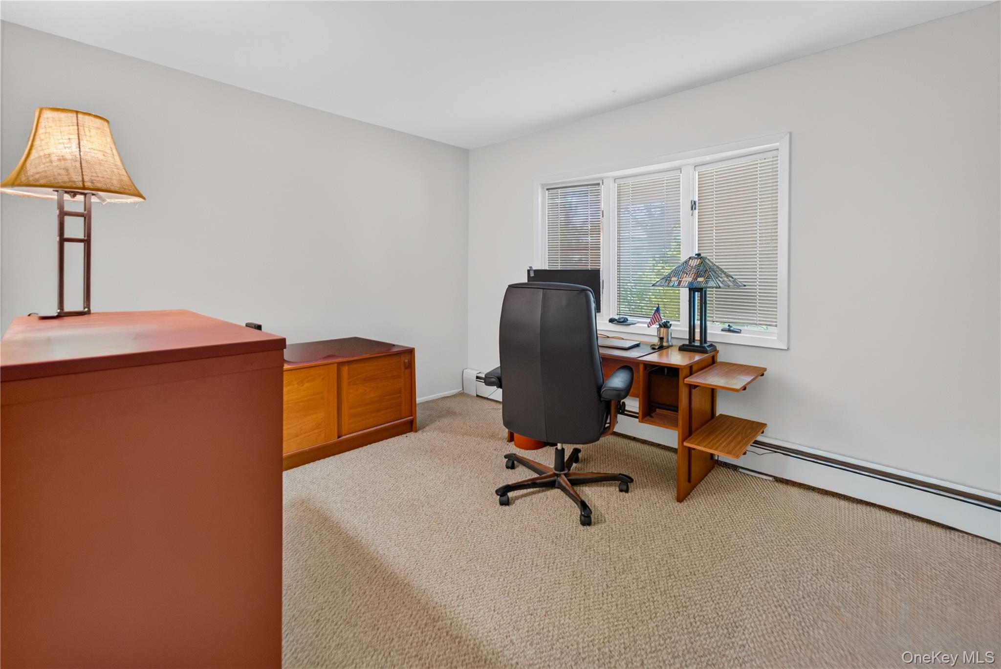 261 Hallock Road Stony Brook, NY 11790 - Photo 9 of 13 a view of a workspace with a window