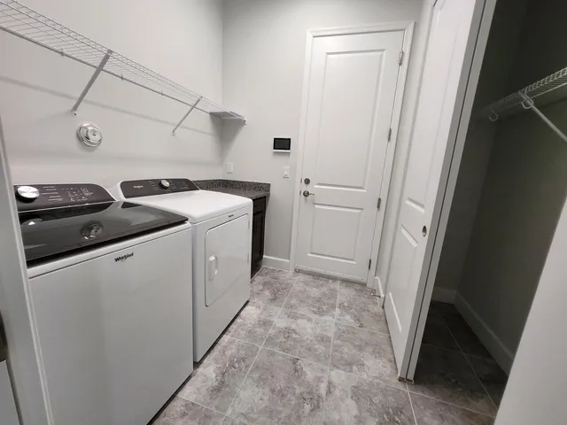 a bathroom with a sink toilet and mirror