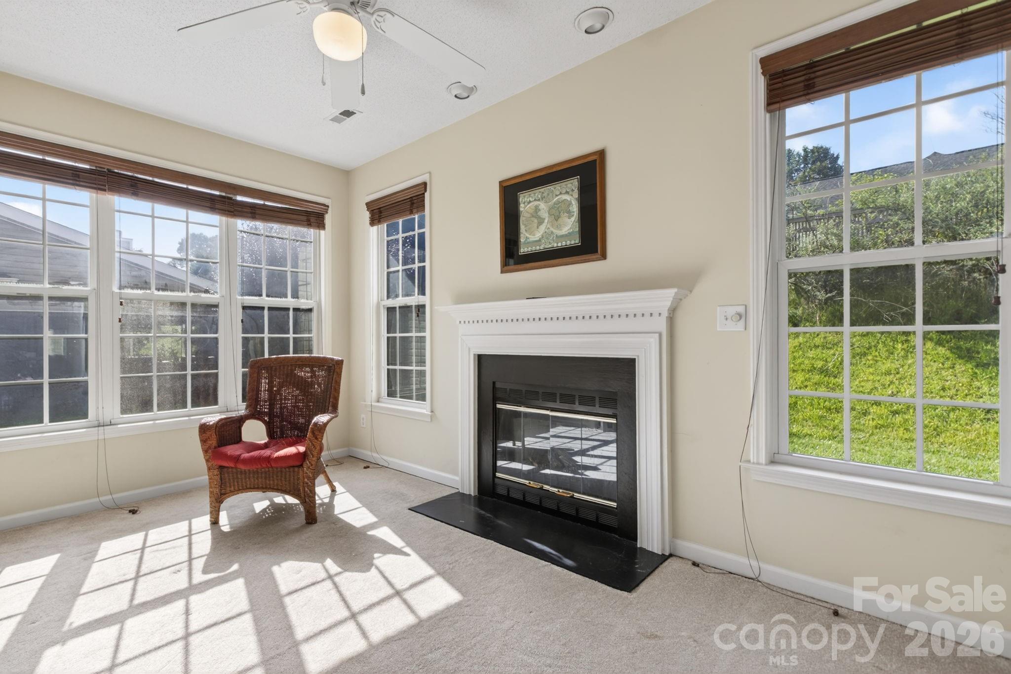 268 Farm Valley Road Fletcher, NC 28732 - Photo 10 of 30 a living room with furniture and a fireplace