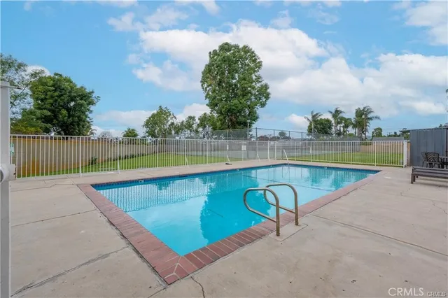 a view of a swimming pool with a lake