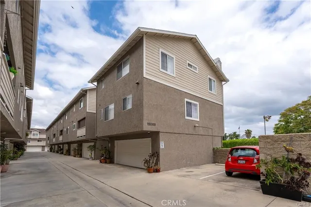 a car parked in front of a house