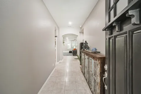 a view of a hallway view with staircase