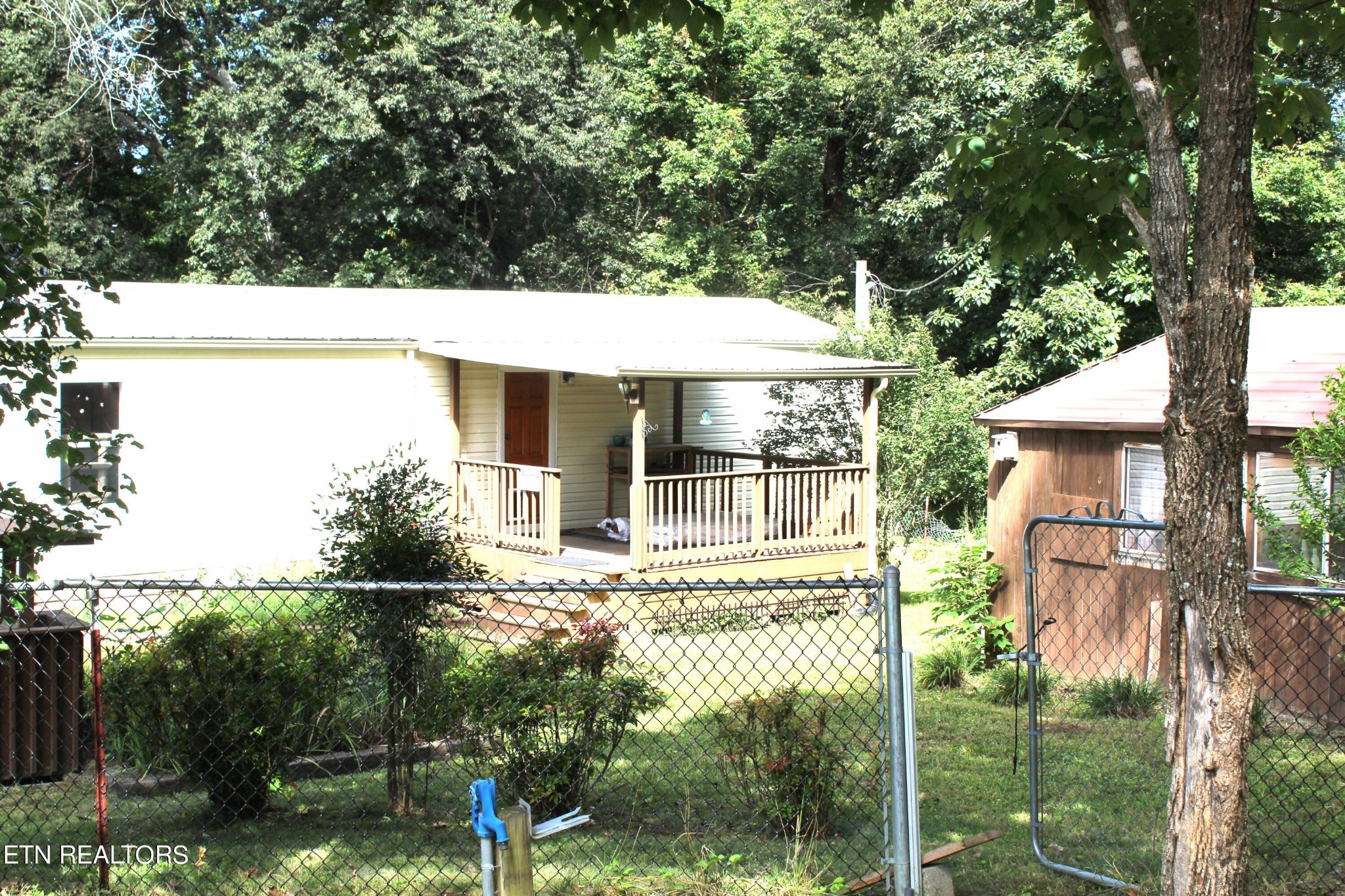 a house view with a garden space