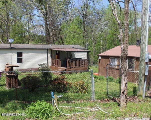 340 Brakebill Road Vonore, TN 37885 - Photo 2 of 33 a view of a house with backyard