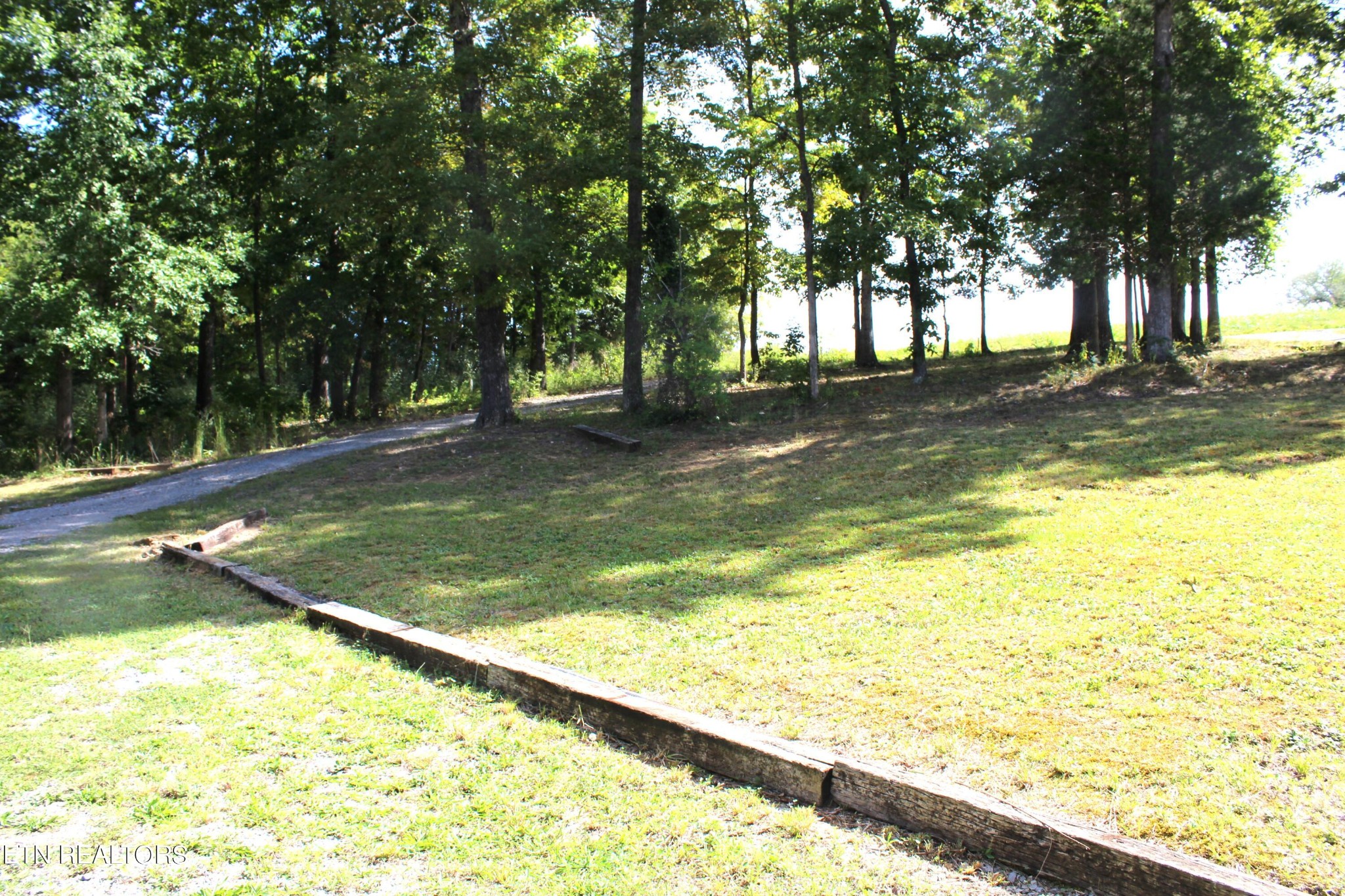 340 Brakebill Road Vonore, TN 37885 - Photo 30 of 33 a view of an outdoor space and swimming pool