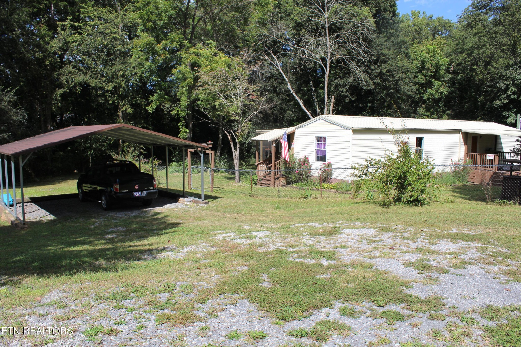 340 Brakebill Road Vonore, TN 37885 - Photo 4 of 33 a view of a house with a yard
