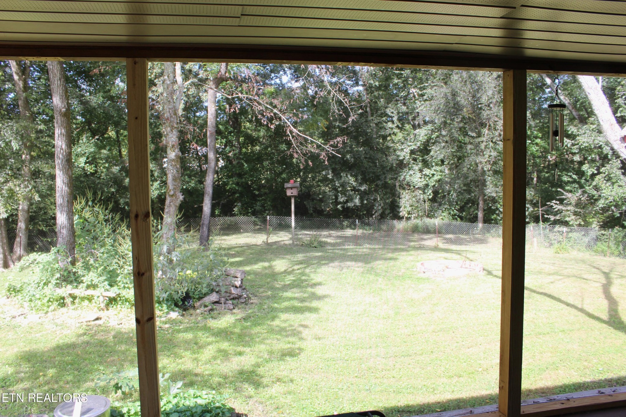 340 Brakebill Road Vonore, TN 37885 - Photo 7 of 33 a view of a lake from a window