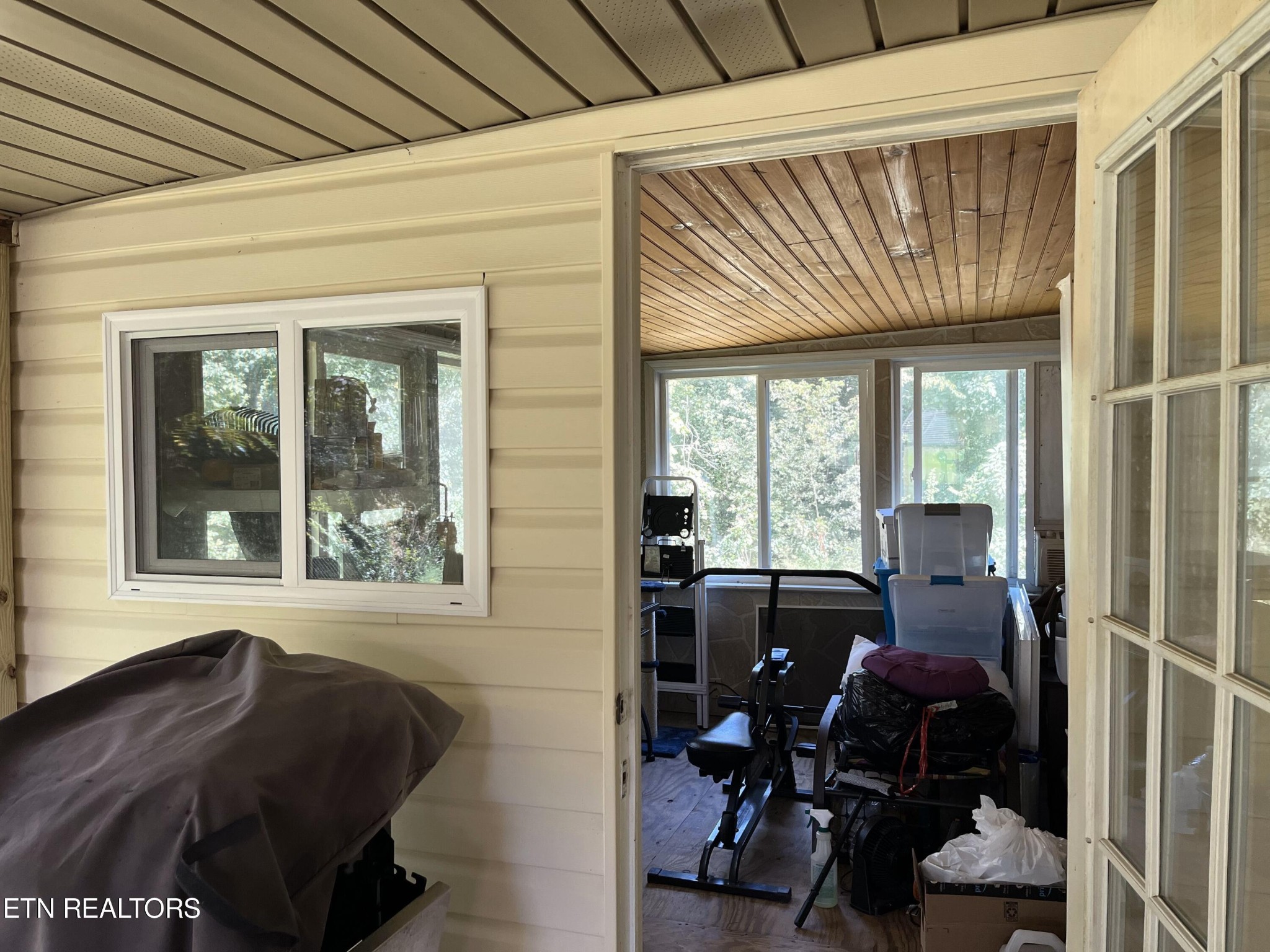 340 Brakebill Road Vonore, TN 37885 - Photo 9 of 33 a view of a room with gym equipment and a large window