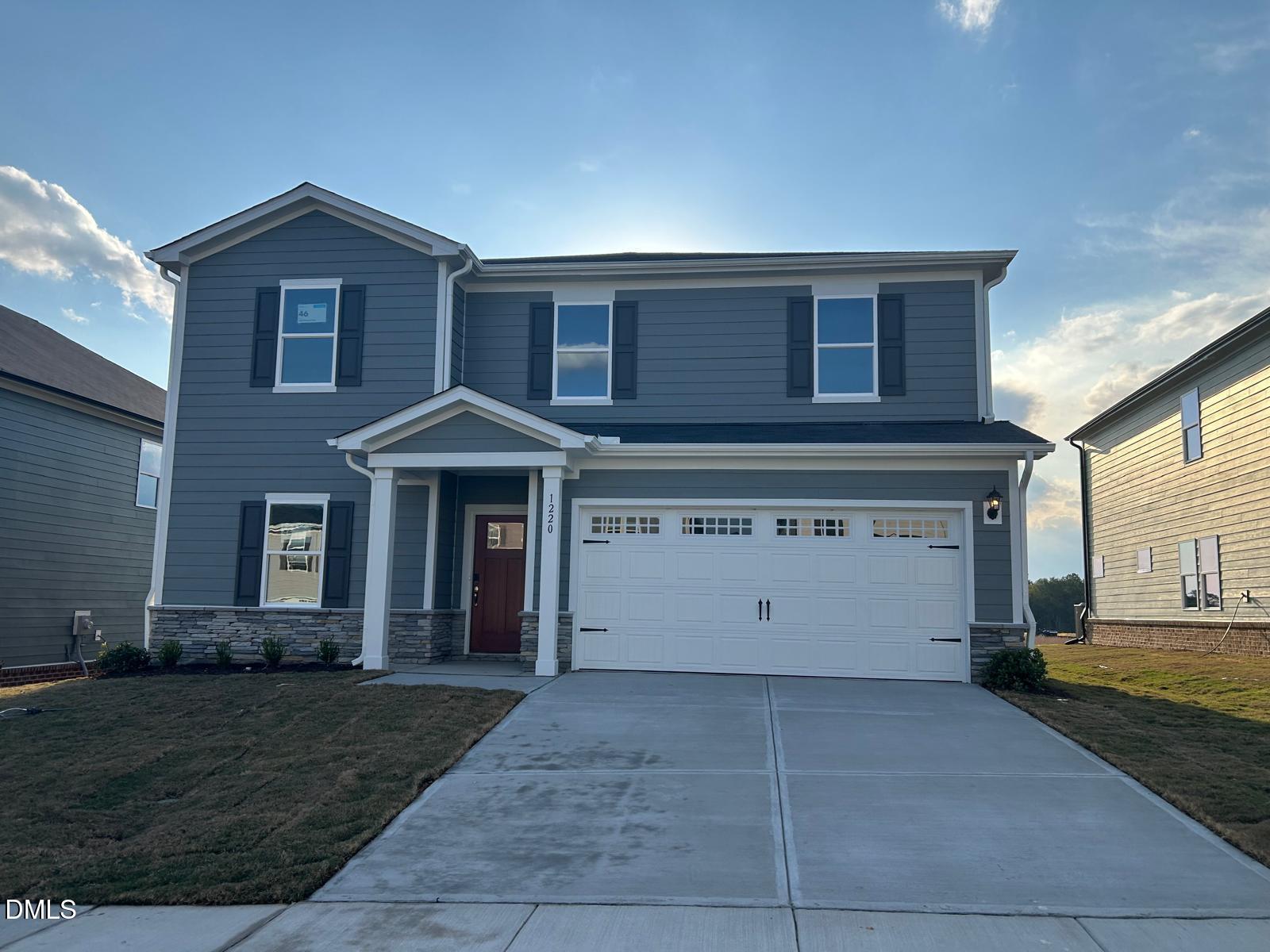 1220 Whitespire Way Zebulon, NC 27597 - Photo 1 of 20 a view of a house with a yard