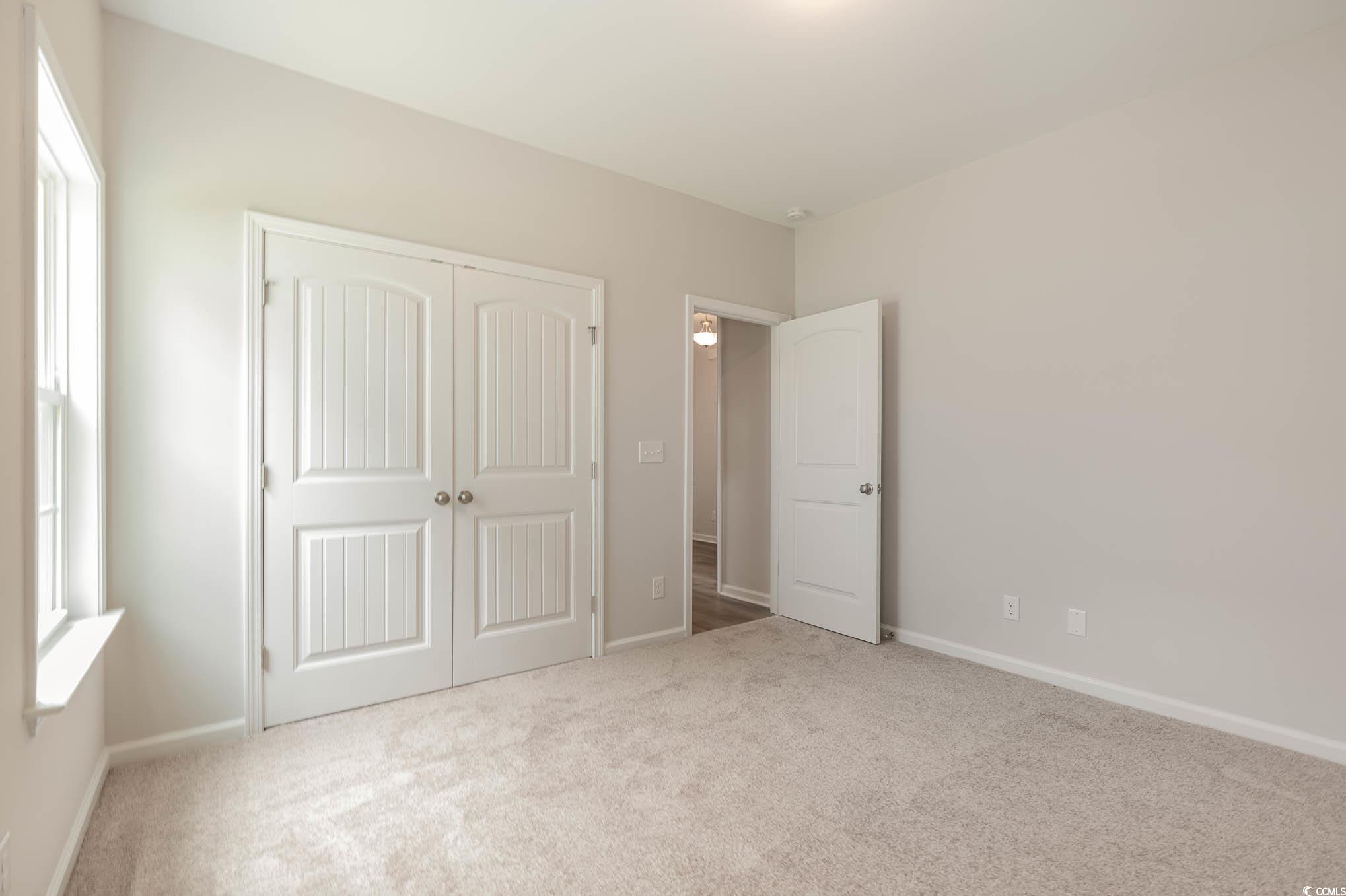 1308 Crooked Hook Road North Myrtle Beach, SC 29582 - Photo 8 of 23 Full bathroom with vanity, shower / bath combinati