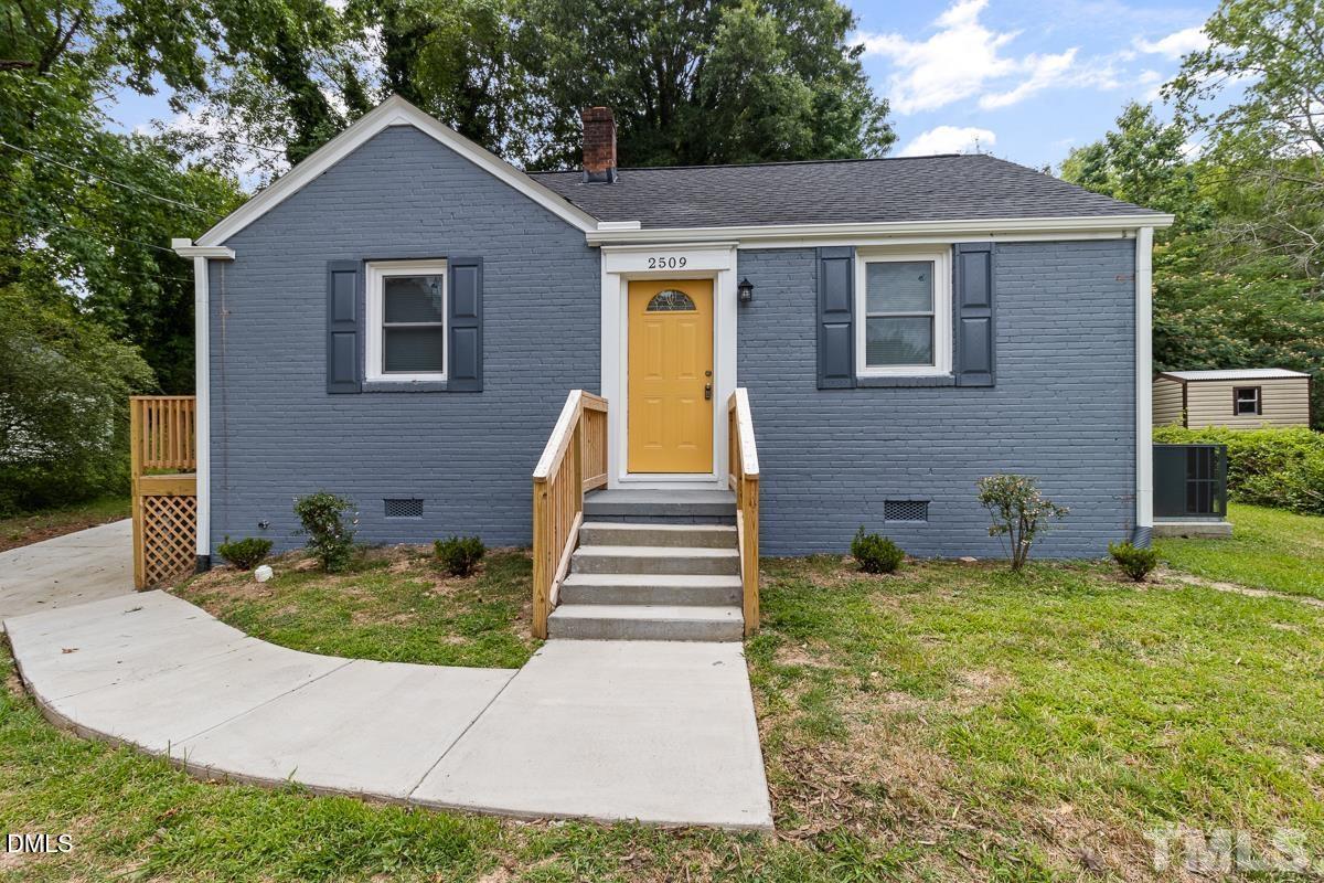 2509 White Oak Avenue Durham, NC 27707 - Photo 1 of 15 a view of a house with backyard porch and a garden