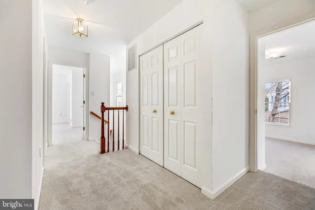 an empty room with a view of a bathroom
