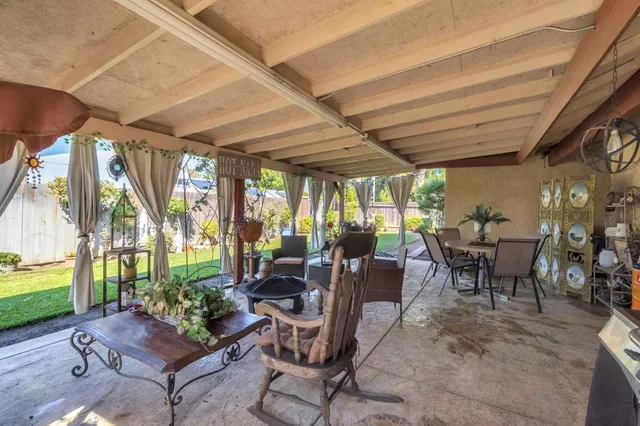 a outdoor space with lots of furniture and plants