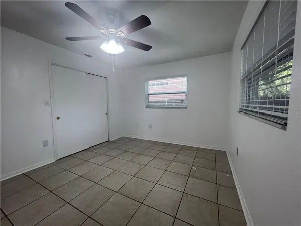 a view of an empty room and window