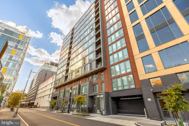 a view of a building and a street