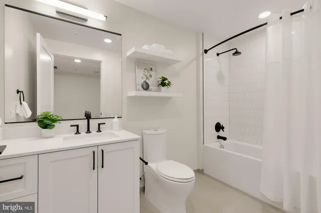 a view of a chairs and table in the balcony