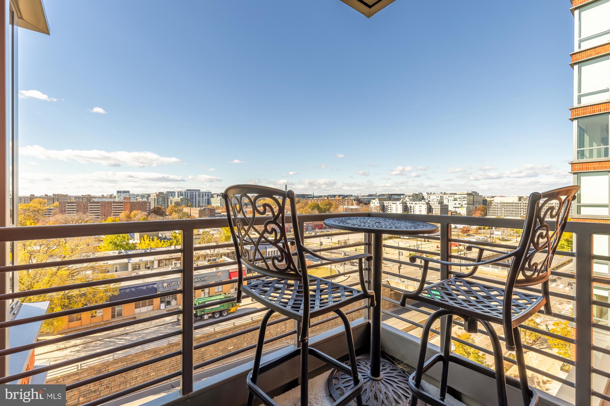 1211 Van Street Southeast, Unit 718 Washington, DC 20003 - Photo 23 of 43 a view of a chairs and table in the balcony