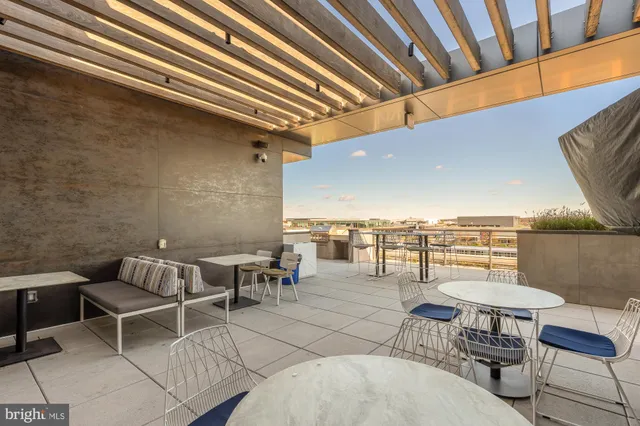 a view of a swimming pool with a lounge chair