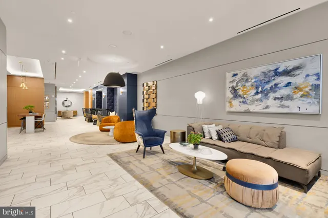 a living room with furniture and a table