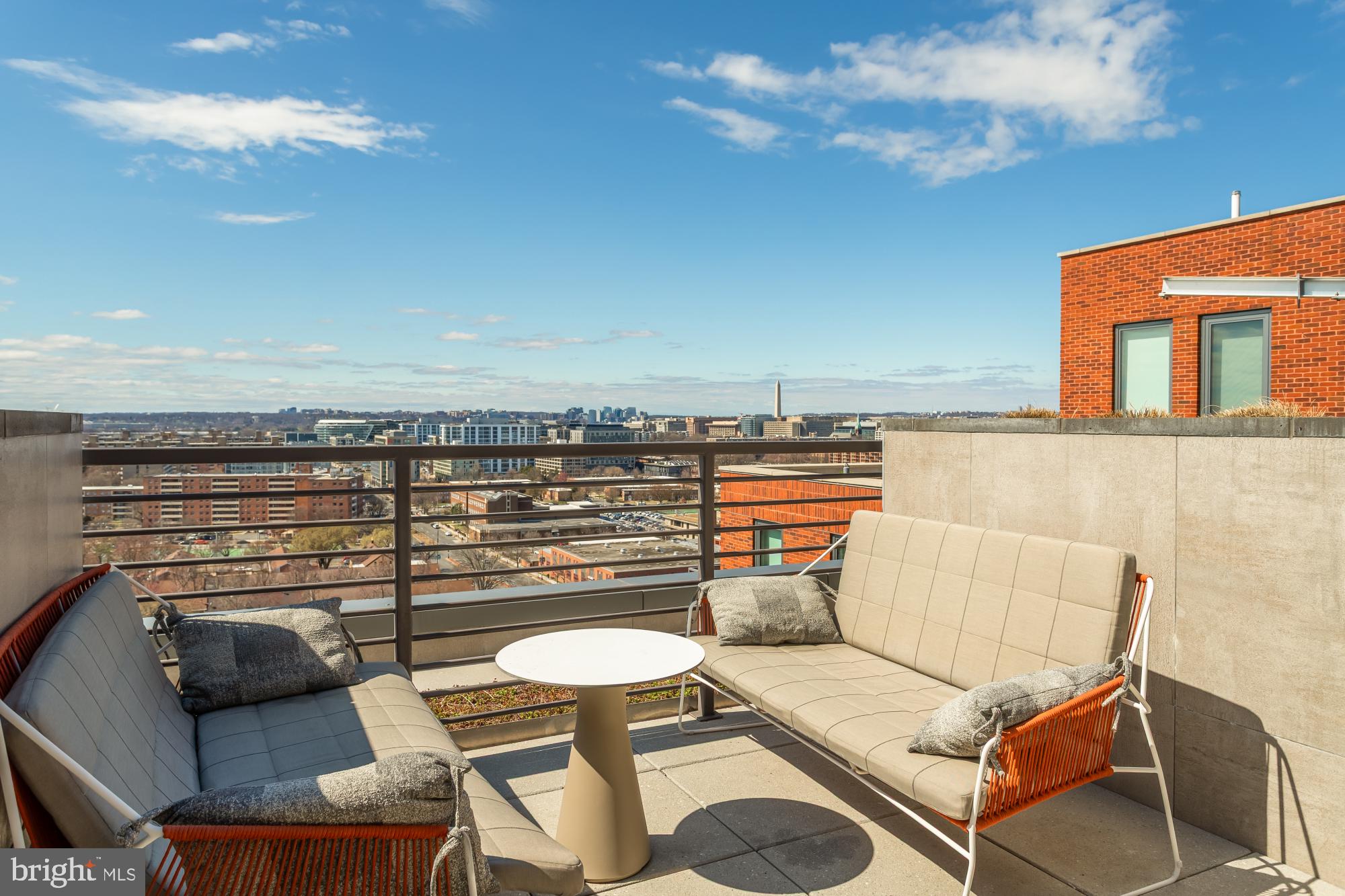 1211 Van Street Southeast, Unit 718 Washington, DC 20003 - Photo 32 of 43 a view of a terrace with chairs