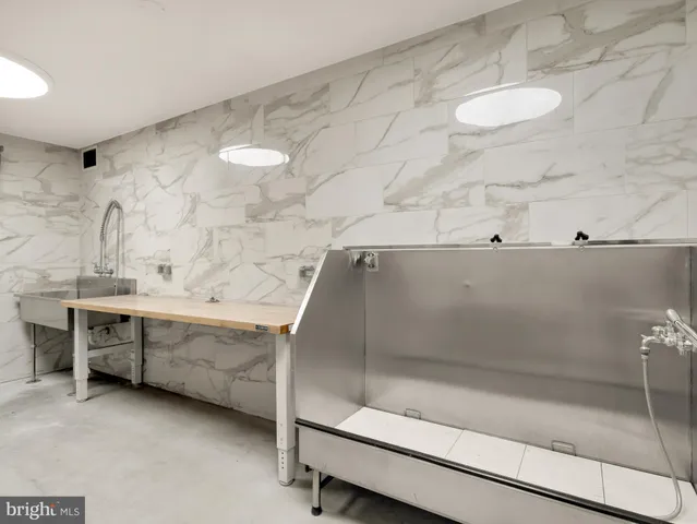 a picture of a wall with a white wall and a picture