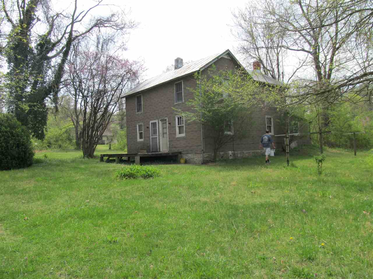 1383 Clearview Road Luray, VA 22835 - Photo 1 of 3 a view of a backyard with a garden