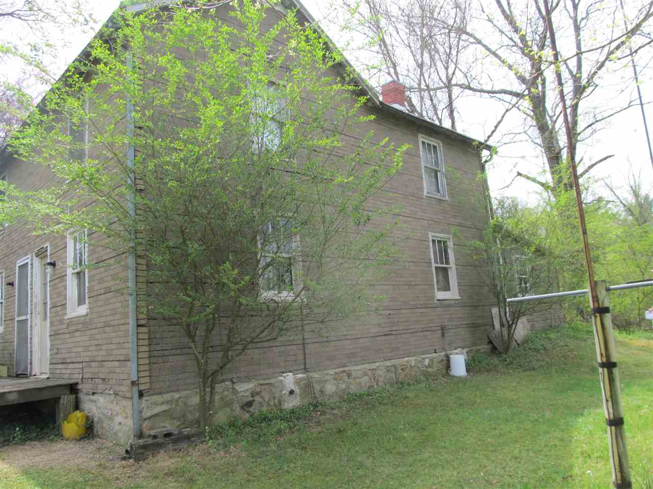 1383 Clearview Road Luray, VA 22835 - Photo 2 of 3 a backyard of a house with lots of green space